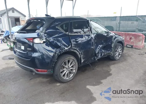 2021 Mazda Cx-5 Grand Touring z USA, uszkodzony, nr VIN JM3KFBDM1M1427615